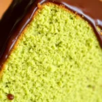 Vibrant Flourless Pistachio Cake with Smooth Chocolate Ganache